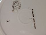 a white plate with a black and white design on it