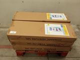 two boxes on top of a pallet on the floor