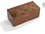 an image of a wooden box with a bird design on it
