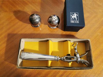 a box of salt and pepper shakers and a box of salt and pepper shakers on a table