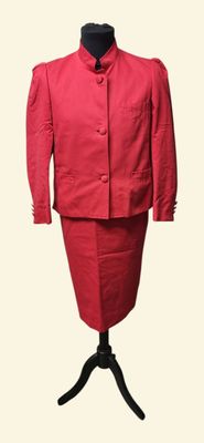 an image of a red suit on a mannequin stand