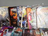 a lot of comic books sitting on a table