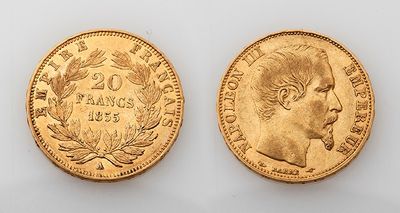 two gold sovereigns, one of which is a head and the other of which is a head