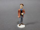 a small figurine of a man with a hat and glasses