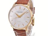 an image of a white and gold wrist watch with brown leather strap
