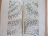 an open book that is sitting on a table