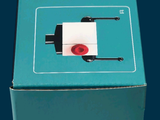 a blue box with a picture of a red object in it