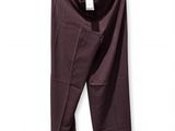 a close up of a pair of pants hanging on a hanger