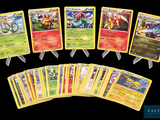several pokemon cards are arranged in a row on a black background