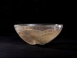 a close up of a glass bowl on a table