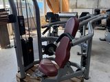 a gym equipment sitting on a pallet in a building