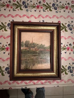 une photo d'un tableau accroché au mur