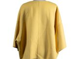 the back view of a yellow jacket on a mannequin mannequin mannequin mannequin mannequin mannequin mannequin manne
