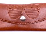 leather business card case with a logo on the front of it