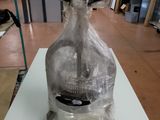 a plastic bag on top of a machine on a table