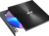 Le lecteur DVD ASUS est ouvert et prêt à l'emploi.