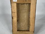 an old picture of a wooden frame with a label on it