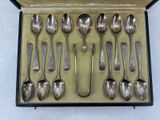 a lot of spoons and spoon spoons in a box