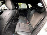 the back seats of a car are empty in the back of the car