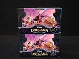 deux boîtes de figurines Lorcana posées sur une surface noire
