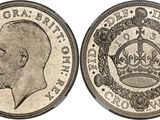 a close up of a coin with a crown on it