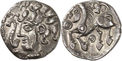 a silver coin with an image of a man on it