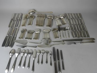 a lot of silverware on the table and silverware on the table