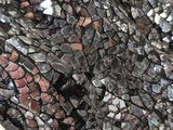 a close up of a lizard head made out of mosaic glass