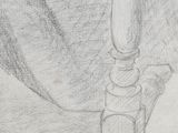 pencil drawing of a candle with a candle holder on a table