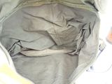 a bag that has a zipper on the inside of it