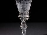 a glass that is sitting on a table