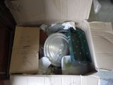 a cardboard box with a lot of items inside of it