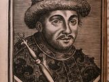 un vieux livre sur lequel figure l'image d'un homme portant une couronne