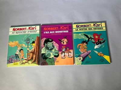 trois livres pour enfants sont posés sur une surface blanche