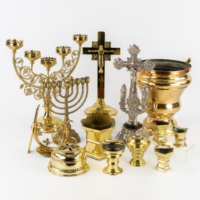 many different types of religious items on the table
