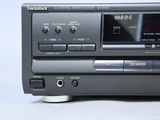 a cd player that is sitting on top of a table