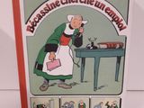 livre de bandes dessinées avec l'image d'une femme en train de faire cuire un hot-dog