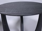a black table with a black top and two black legs