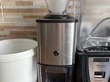 a blender, coffee maker, and other kitchen items on a counter