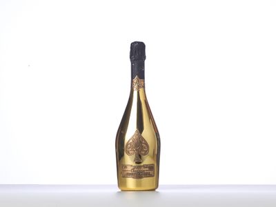 a close up of a bottle of champagne on a table