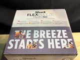 the breeze star ' s here box is open on a wooden table