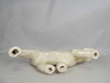 an image of a white ceramic sculpture of two elephants
