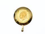 a close up of a gold coin with a woman ' s face on it