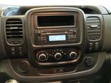 the dashboard of a car with a radio and a steering control