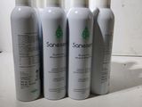 six bottles of some kind of lotion sitting on a table