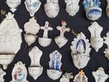 a lot of ornaments that are on a black table