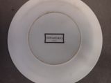 a white plate with a black and white label on it