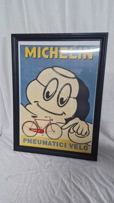 photo encadrée représentant un personnage de dessin animé avec un vélo