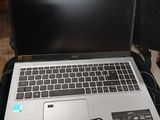 a laptop that is sitting in a suitcase on the floor