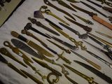 a lot of different types of knives on the table